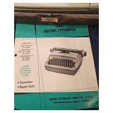 Vintage Sears electric typewriter in case with manual - works