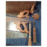 Vintage wood box with vintage tools: saws, files, hatchet head, chalk liner and more