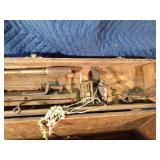 Vintage wood box with vintage tools: saws, files, hatchet head, chalk liner and more