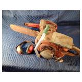 2 Homelite chainsaws and earmuffs