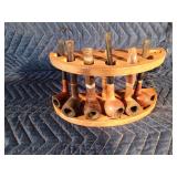 6 Tobacco pipes in a pipe holder