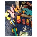 Lot of vintage metal and plastic toys