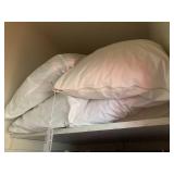 Numerous pillows...