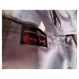 Ties, suits and robes; all on side ...