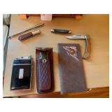 Pocket knives, lighters, leather bi...