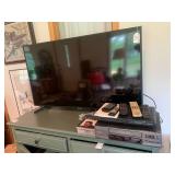 Samsung flat screen TV with VHS and...
