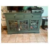 Wood TV stand/cabinet on rollers...