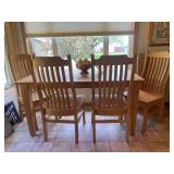 Oak table with 4 chairs and 2 leave...