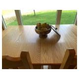 Oak table with 4 chairs and 2 leave...