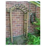 Wood arbor (has been sitting outsid...