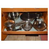 Pots and pans; all on top shelf...