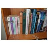 Assorted books; all on bottom 2 she...