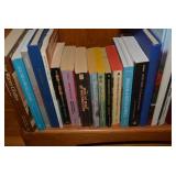 Assorted books; all on bottom 2 she...