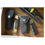 Weaver gun scopes, pocket knives...