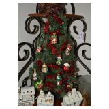 Christmas wreaths, train, trees, to...