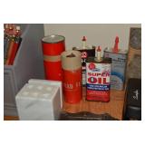All items on top of desk - oil cans...