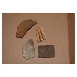 Buffalo tooth, metal piece, rocks a...