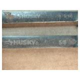 These are Husky ratcheting combination wrenches featuring a 12-point design for versatile use.