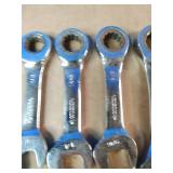 Snap On 3/8" Extension and Huskey SAE chrome-plated stubby ratcheting combination wrenches, often used for working in tight spaces.