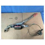 Hand-operated cable puller, commonly referred to as a "come-along