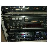 This is a professional karaoke equipment rack containing various audio components.