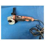 This is a Black & Decker angle grinder, likely a model in the 4-1/2 or 5-inch range