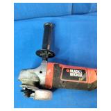 This is a Black & Decker angle grinder, likely a model in the 4-1/2 or 5-inch range