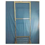 This is a R&B Wire Products commercial laundry cart with a clothes hanging rack.