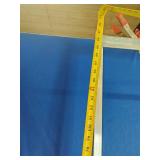 This is a R&B Wire Products commercial laundry cart with a clothes hanging rack.