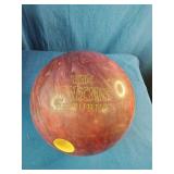 This is a 15 pound Dyno-Thane The Thing Returns bowling ball featuring a red and maroon swirl pattern