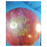 This is a 15 pound Dyno-Thane The Thing Returns bowling ball featuring a red and maroon swirl pattern