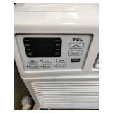 TCL window air conditioner, 12,000 BTU , featuring digital controls and adjustable vents. With Remote Control