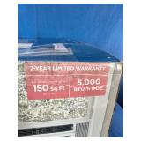 Midea EasyCool Window Air Conditioner with mechanical controls and a 5,000 BTU cooling capacity.