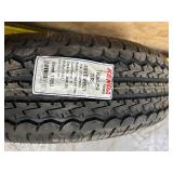 RADIAL TRAILER TIRE (cracked seal)