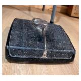 1950 Detecto bathroom scale featuring a speckled black finish and a bubble glass dial