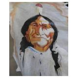 HAND-PAINTED ART ON ANIMAL HIDE