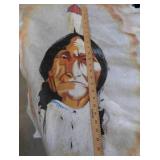 HAND-PAINTED ART ON ANIMAL HIDE