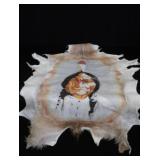 HAND-PAINTED ART ON ANIMAL HIDE