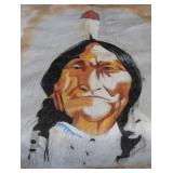 HAND-PAINTED ART ON ANIMAL HIDE