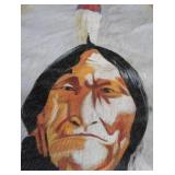 HAND-PAINTED ART ON ANIMAL HIDE