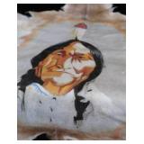 HAND-PAINTED ART ON ANIMAL HIDE