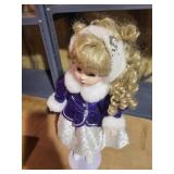 Collectible Blonde Doll in Formal Winter Outfit