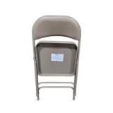 4 Uline H-2522 Padded Folding Chairs - Tan Vinyl Seat and Back