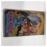 Lot of 2 VHS Movies – Disney Jungle Book & Space Jam Michael Jordan Bugs Bunny