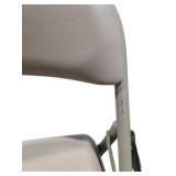 4 Uline H-2522 Padded Folding Chairs - Tan Vinyl Seat and Back