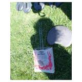 Drink Holder and Fishing Pole Holder.  Also a Seat for the top of a 5 gallon bucket and a Grill Basket.