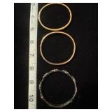 Gold and Copper bracelets