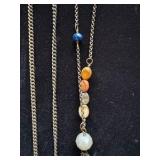 Gold and bronze necklaces