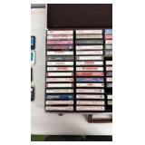 50+ Cassette Tapes and Briefcase Style Storage case.