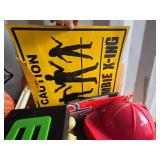 Halloween decoration lot including signs, buckets, hats, and pumpkin decor
